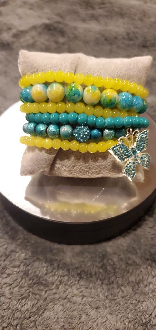 Turquoise and yellow Stack with a butterfly Charm