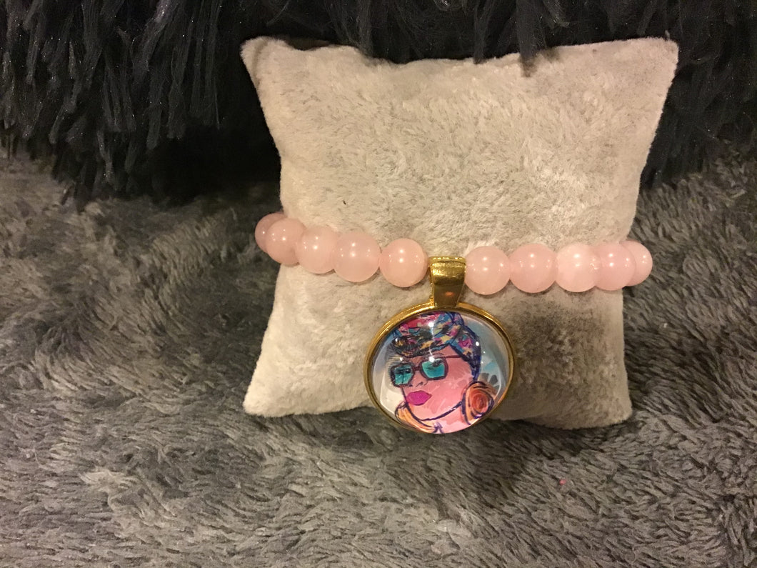 Pink quartz with lady charm