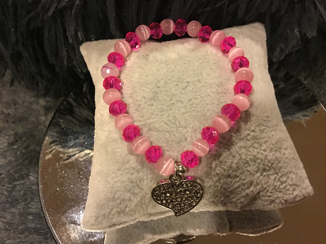 Little girl pink bracelet with charm